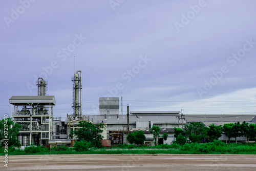 Industrial factory with sunset sky, Modern factory building blue sky clouds