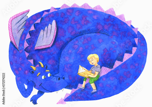 Little boy reading book to dragon