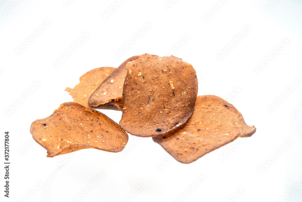 raw fish cracker on white background. raw fish cracker on white background.