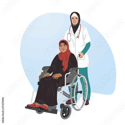 A girl nurse rolls a wheelchair with a patient. Disabled man.