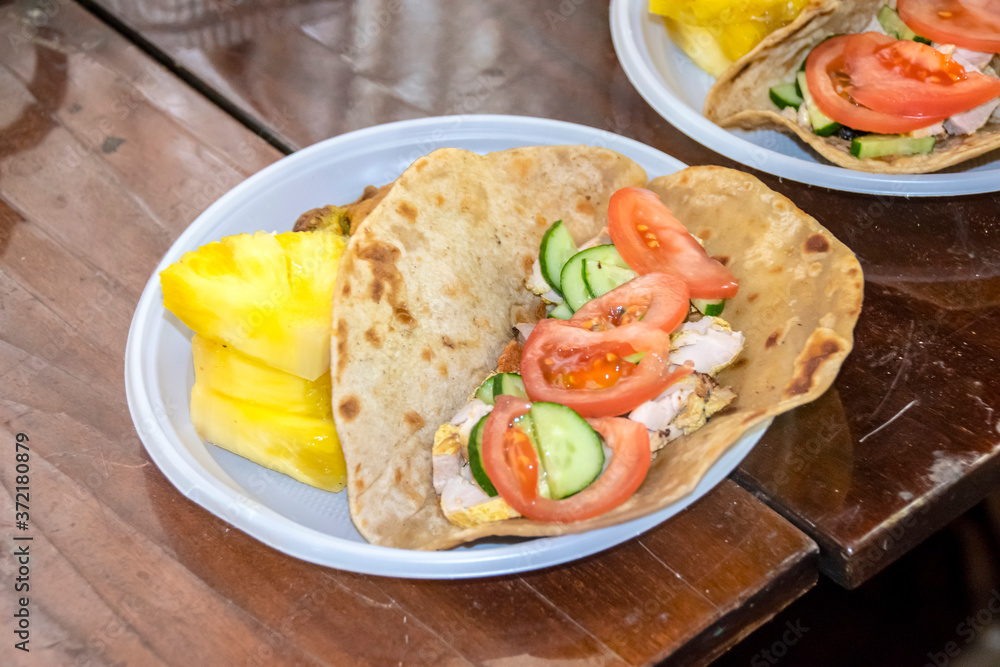 healthy breakfast vegetables and meat on a tortilla healthy breakfast vegetables and meat on a tortilla