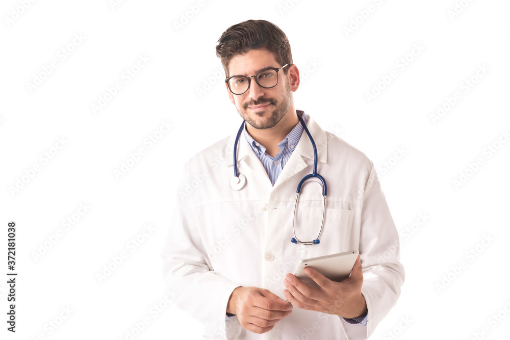 Male doctor portrait at isolated white background while holding touchpad in his hand Male doctor portrait at isolated white background while holding touchpad in his hand