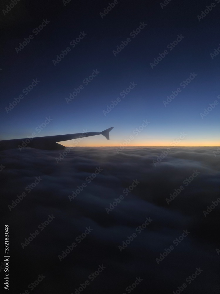 airplane in the sky at sunset airplane in the sky at sunset