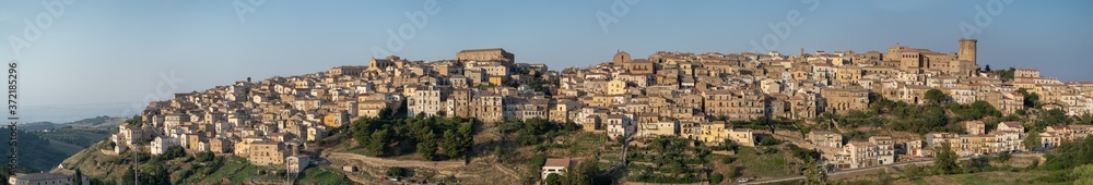 Tricarico town, Matera. Italy. Panorama wide view of Tricarico town on a hill overlooking the Norman Tower and the monastery of St. Chiara. Basilicata region