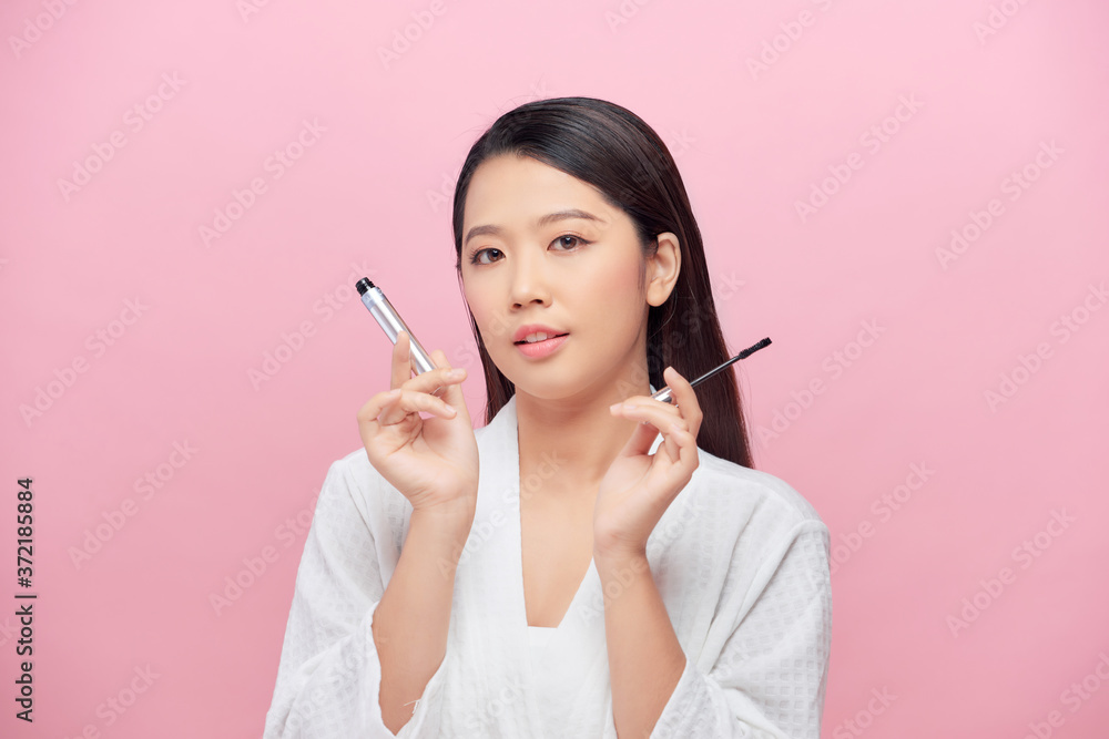 Happy beautiful young woman get ready do make up daily morning routine at home Happy beautiful young woman get ready do make up daily morning routine at home