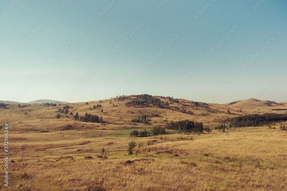 Russia. Travel across Russia. Hills, mountains and fields. Panorama of the steppes.