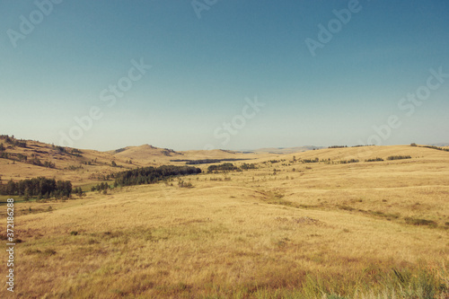 Russia. Travel across Russia. Hills, mountains and fields. Panorama of the steppes. © andreswestrum