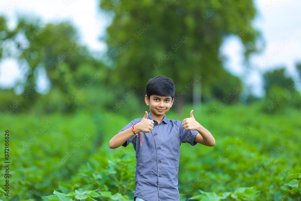 Little indian boy showing thumb up Little indian boy showing thumb up