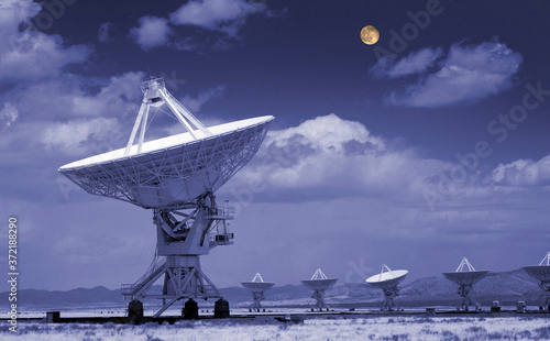 Moon over the VLA Radio Telescope in New Mexico	 photo