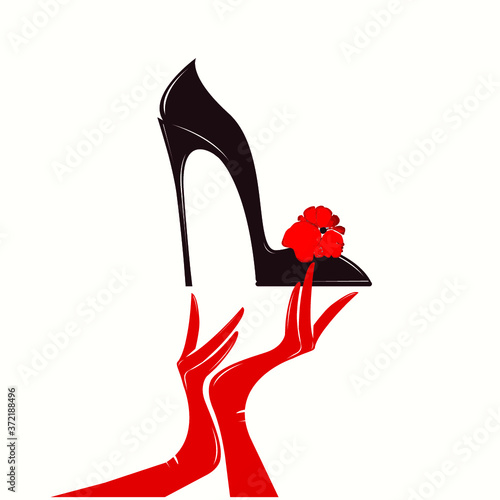 High heel stiletto shoe with decorative flower and woman hands with red gloves.Footwear logo isolated on white background.Fashion and style icon.Elegant, luxury, feminine design.