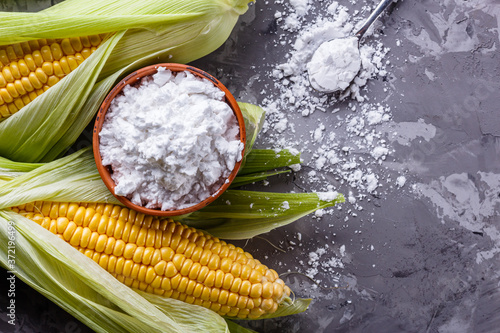 corn starch on a dark stone background photo