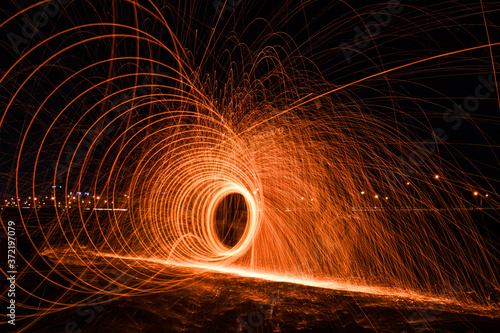 Trajectories of burning sparks