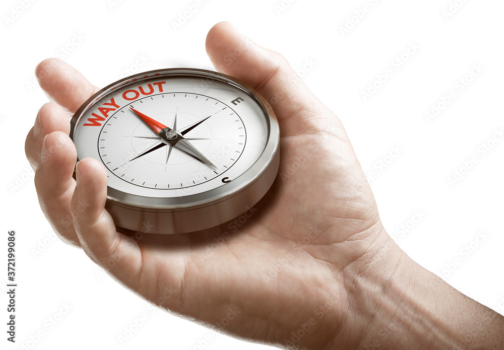 Crisis exit strategy or plan. Man holding a conceptual compass. Crisis exit strategy or plan. Man holding a conceptual compass.