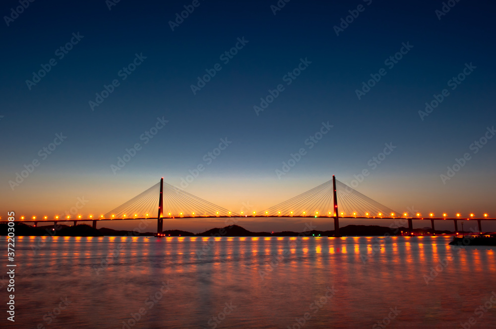 Wonderful sunset night view of the grand bridge