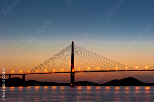 Wonderful sunset night view of the grand bridge © Chongbum Thomas Park