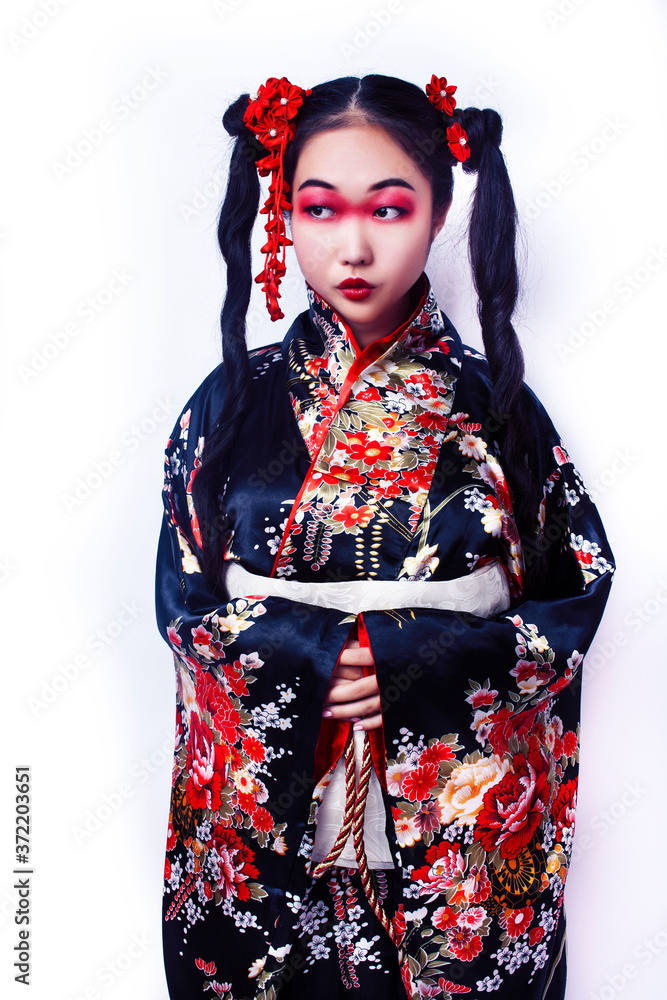 young pretty geisha in black kimono with sakura, asian ethno closeup on white background isolated young pretty geisha in black kimono with sakura, asian ethno closeup on white background isolated