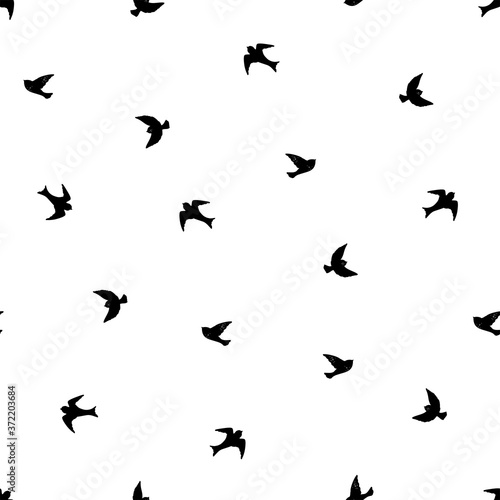 Flying birds, hand drawn seamless pattern on white background. Minimalistic vector illustration.