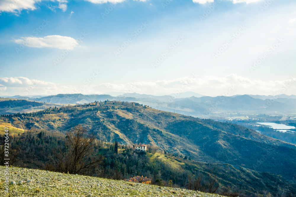 Fresh italian landscape with small house in the middle