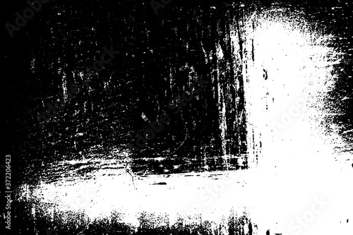 Dirty grunge background. The monochrome texture is old. Vintage worn pattern. The surface is covered with scratches