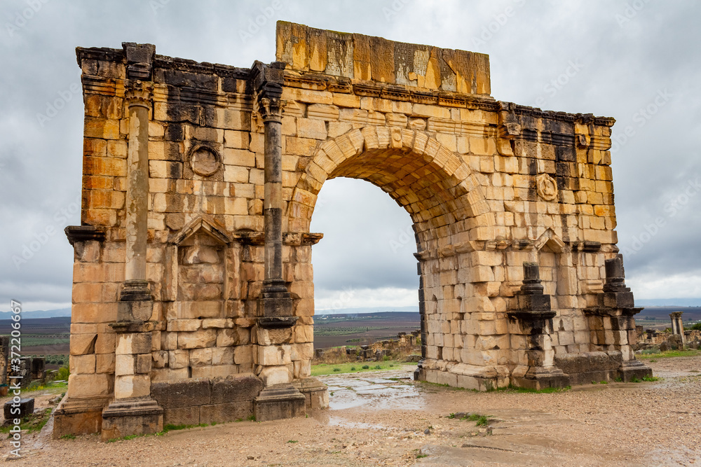 Arch of Caracalla (Triumphal Arch) in Roman town Volubilis, Morocco