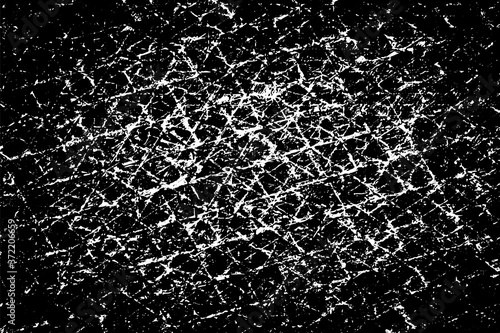 Dirty grunge background. The monochrome texture is old. Vintage worn pattern. The surface is covered with scratches