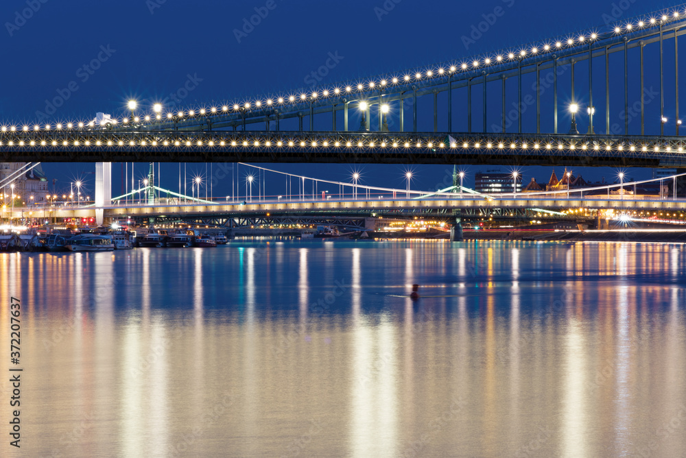 Bridges over Danube river in Budapest at night