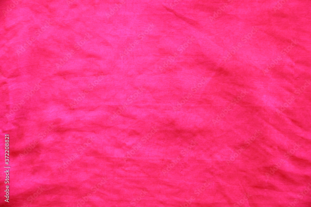 texture of transparent pink fabric with pleats spiral and diagonal texture of transparent pink fabric with pleats spiral and diagonal