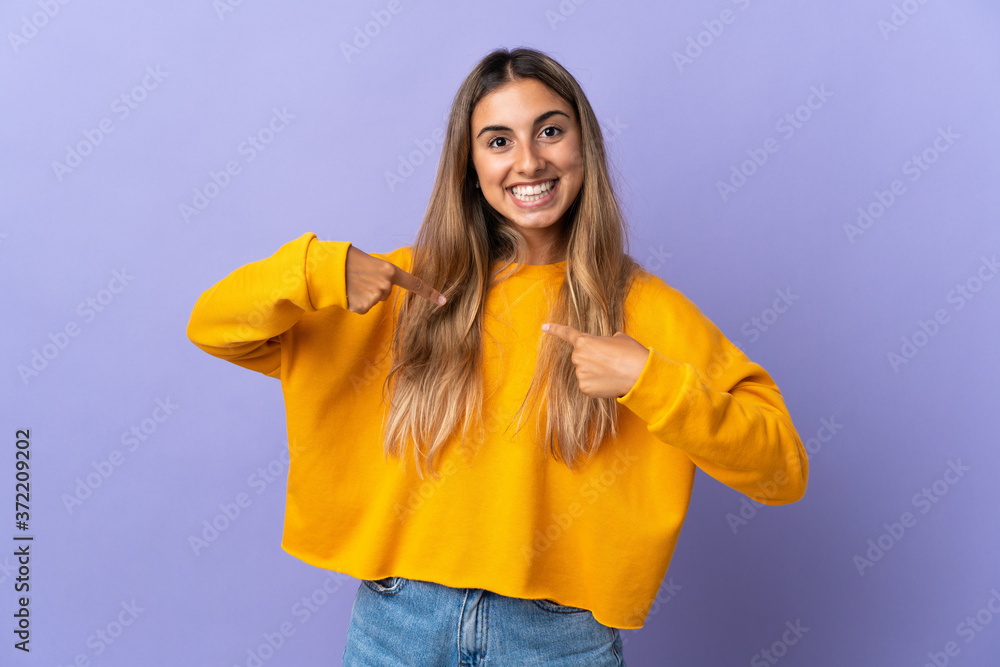 Young hispanic woman over isolated purple background with surprise facial expression Young hispanic woman over isolated purple background with surprise facial expression