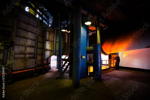 Metallurgy plant factory workshop. Electric arc furnace for melting metal. © Alexey Rezvykh