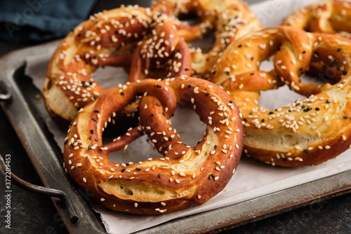 Homemade whole meal pretzels with sesame and salt. Oktoberfest.