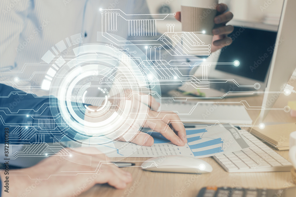 Double exposure of technology hologram with man working on computer background. Concept of big data. Double exposure of technology hologram with man working on computer background. Concept of big data.