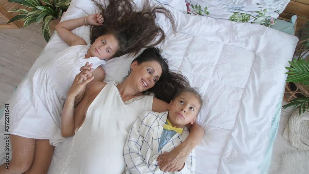 Happy family. Mother with her kids Happy family. Mother with her kids
