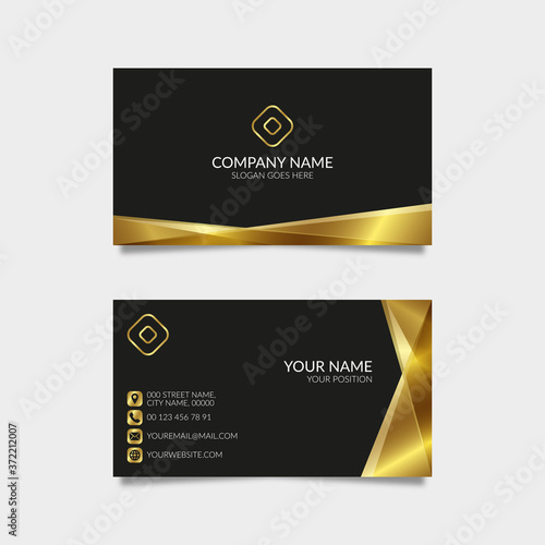 Modern golden business card with black background