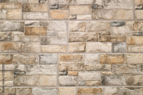 wall covered with rectangular stone tiles, texture