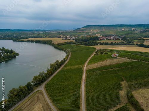 Fototapeta Naklejka Na Ścianę i Meble -  Aerial of Breitenauer See (Lake Breitenau) at Loewenstein, Germany - the lake is closed for the public during the Corona Pandemic in August 2020.