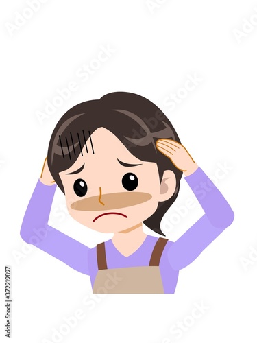 エプロンを着た主婦