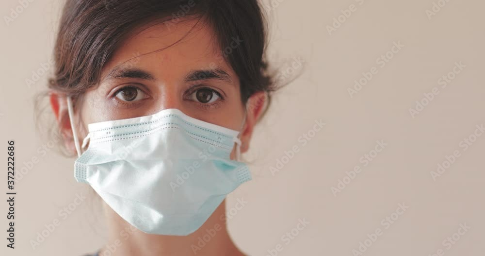 Portrait of female with mask protecting from coronavirus flue. Using Mask to protecting of covid-19 virus. Portrait of female with mask protecting from coronavirus flue. Using Mask to protecting of covid-19 virus.