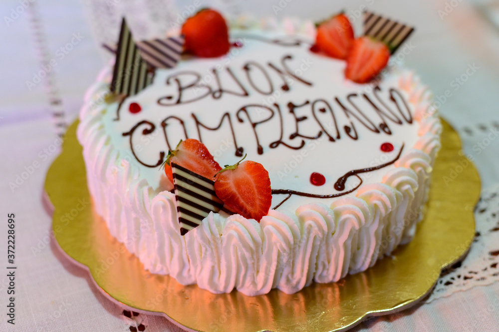 Traditional White Italian Birthday Cake With Congratilations Buon Compleanno Means Happy