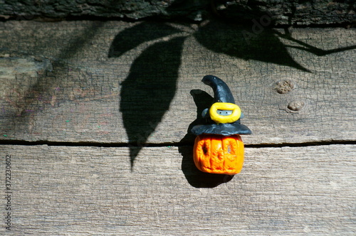Figurine pumpkin out of clay for Halloween.
