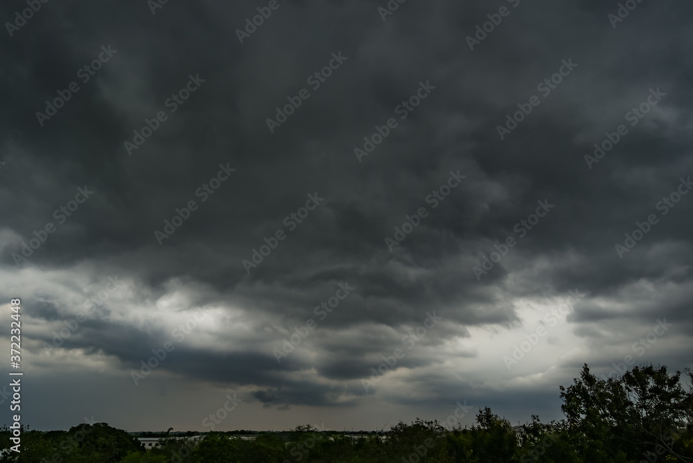 dark storm clouds with background,Dark clouds before a thunder-storm. dark storm clouds with background,Dark clouds before a thunder-storm.