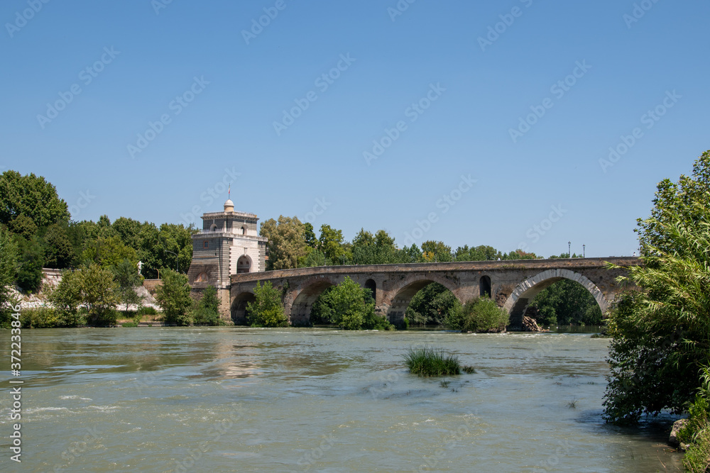 Milvian Bridge on river Tiber in Rome, Italy