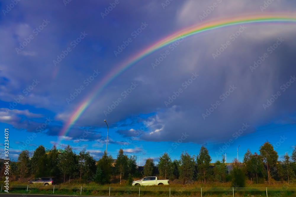 Colourful rainbow over Country side in Sydney NSW Australia Colourful rainbow over Country side in Sydney NSW Australia
