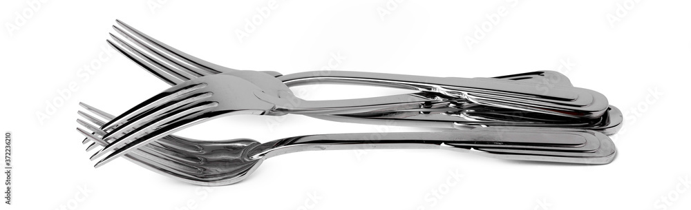 Set of new cutlery isolated on white background Set of new cutlery isolated on white background