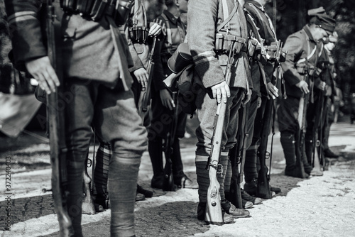 Detail of a rifle held by a soldier. Rifle and uniform from the First World War photo