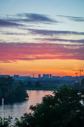 sunset over the city © Sergey