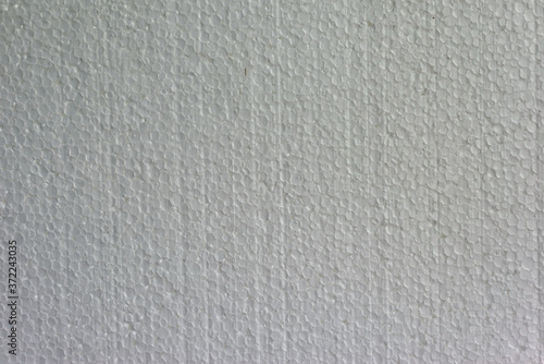 closeup white foam texture, top view. Plastic photo