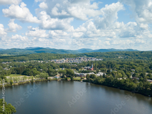 View of a little town, lake and river from the sky. Cowansville, Quebec, Canada