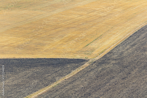 Abstract symmetry in agriculture field landscape. Minimalistic czech landscape