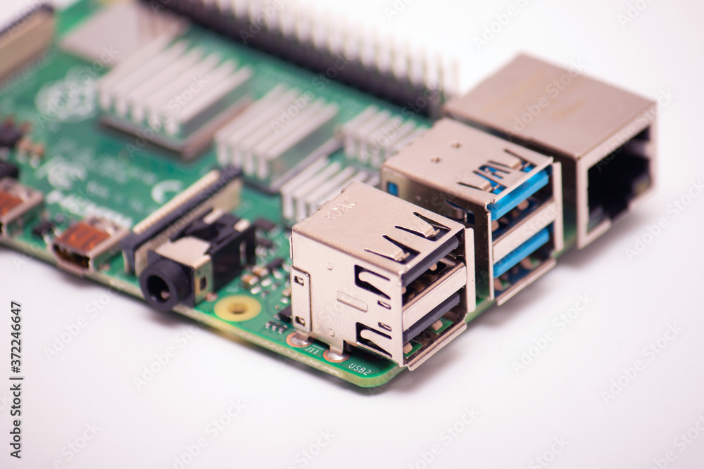 Kiev, Ukraine - August 13th, 2020: Focused USB 2.0 connector on Raspberry Pi 4 computer. defocused remainder of the microboard Kiev, Ukraine - August 13th, 2020: Focused USB 2.0 connector on Raspberry Pi 4 computer. defocused remainder of the microboard