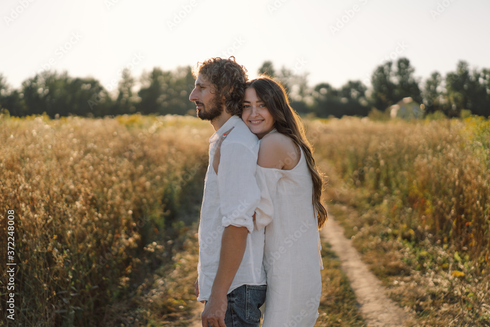 Happy summer. A loving couple together in nature. Happy vacation. Family recreation. Enjoyment and relaxation. Happy summer. A loving couple together in nature. Happy vacation. Family recreation. Enjoyment and relaxation.